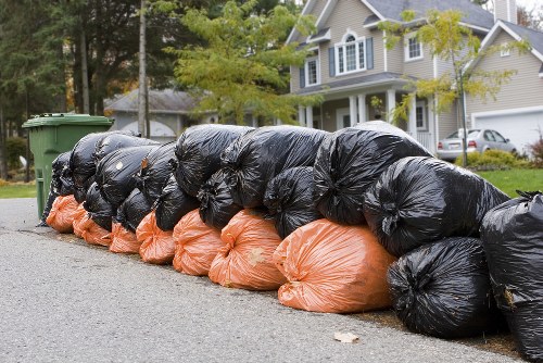 Residents sorting recyclables for waste collection