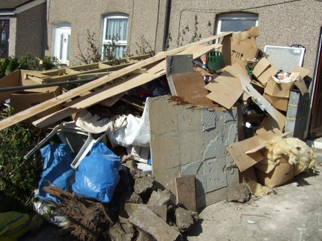 Different types of waste being sorted for recycling